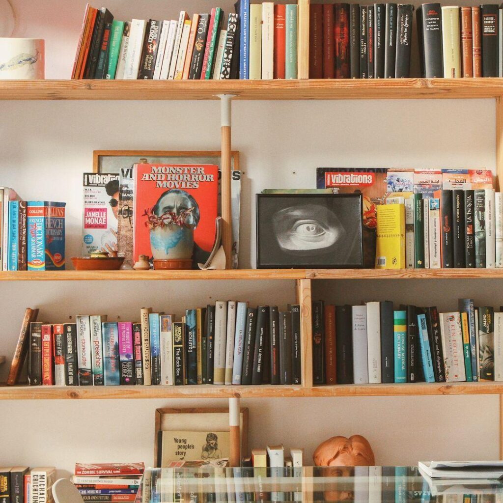 A bookshelf of books of many genres and short stories.